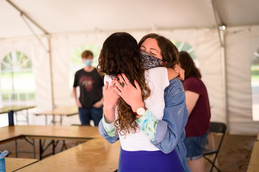 folks hugging